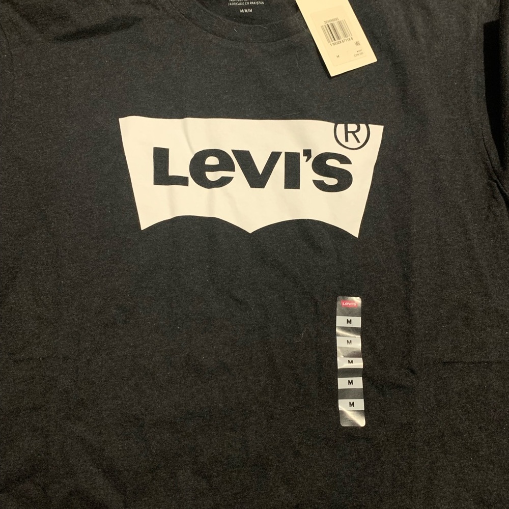 Dark grey Levi’s shirt. Medium